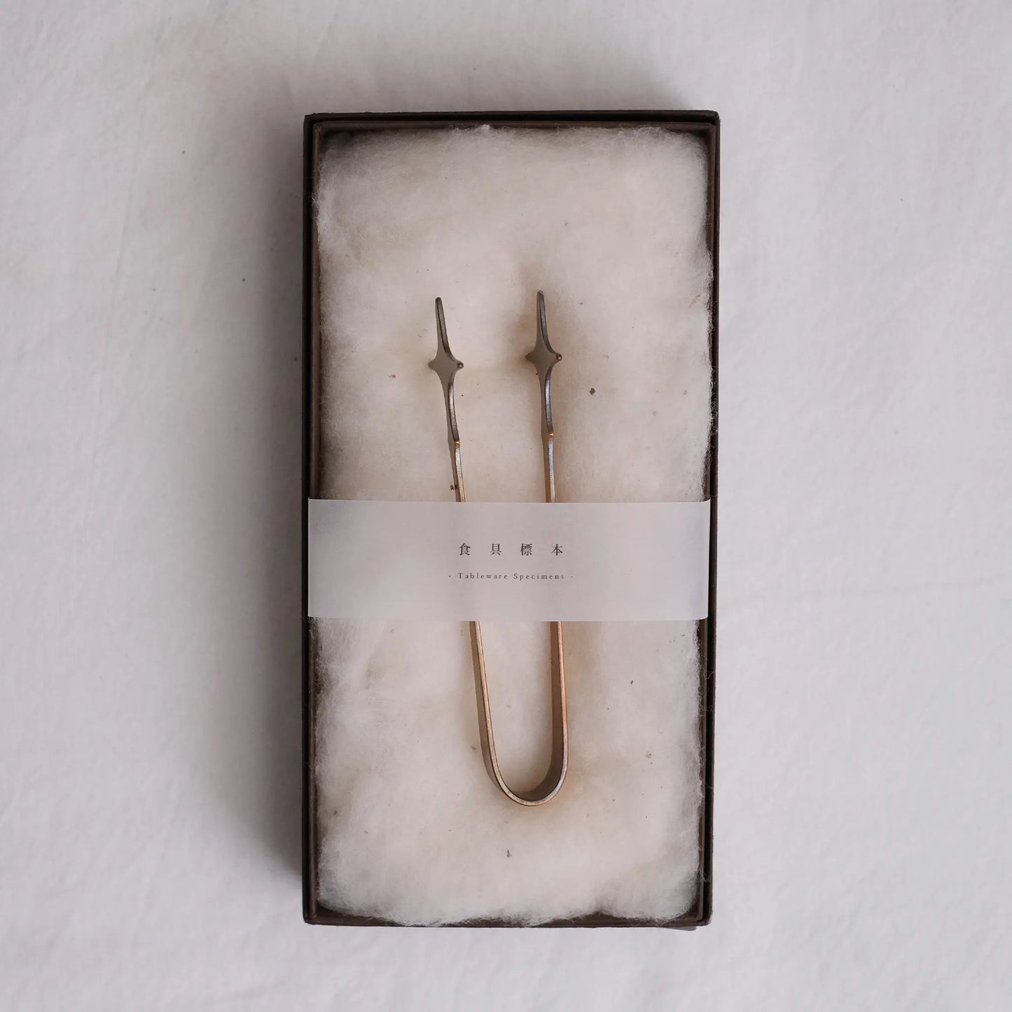 
                  
                    Tableware specimens | Twin Comet Mini Tongs
                  
                