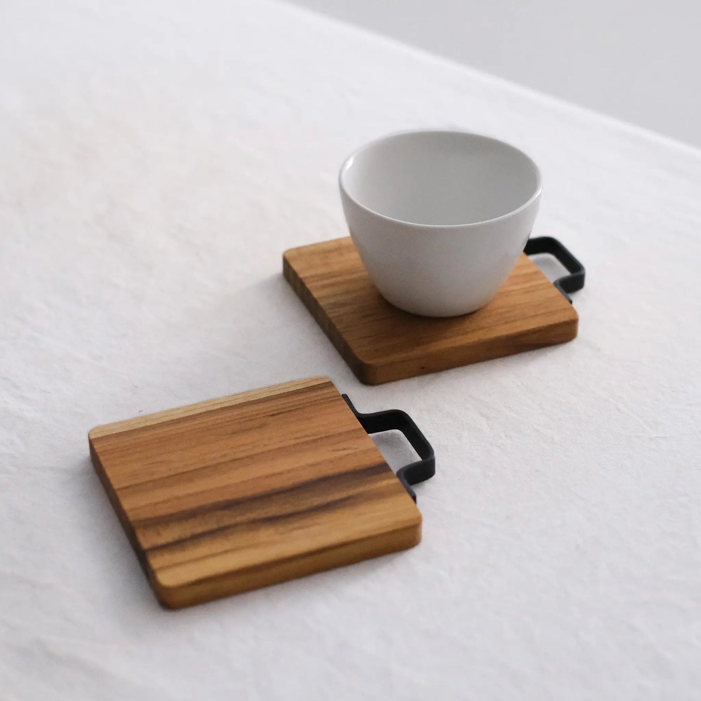 
                  
                    Iron Handle Coaster
                  
                