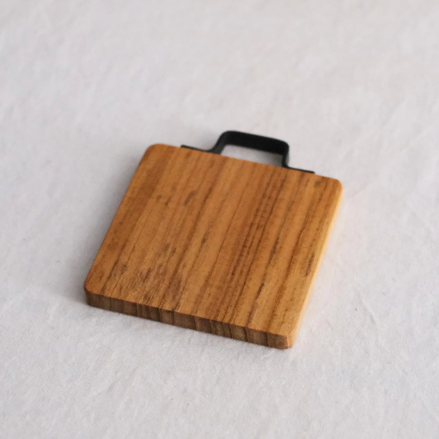 
                  
                    Iron Handle Coaster
                  
                