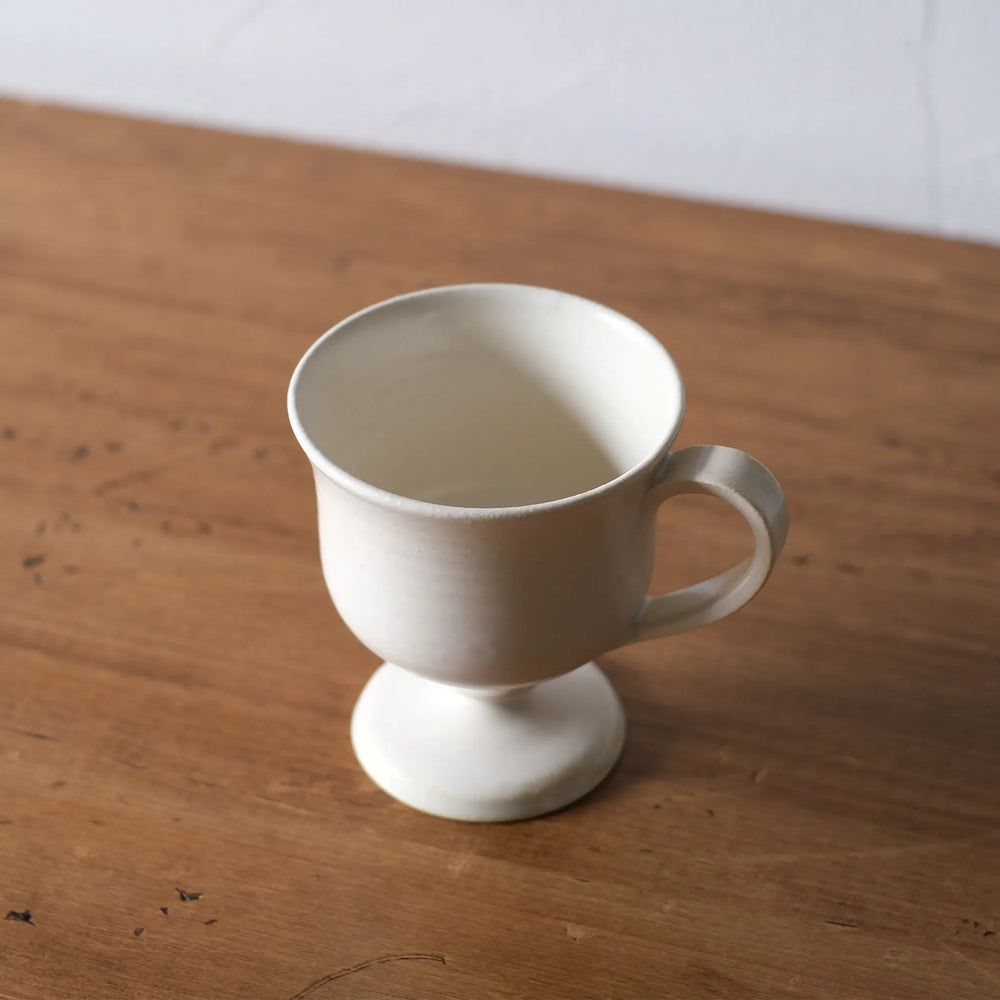 
                  
                    Ball-legged coffee cup
                  
                