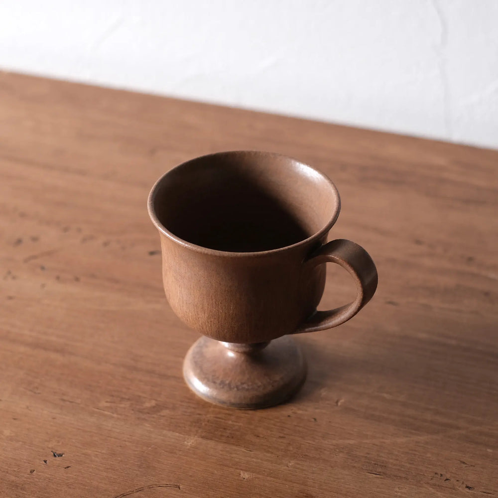 
                  
                    Ball-legged coffee cup
                  
                