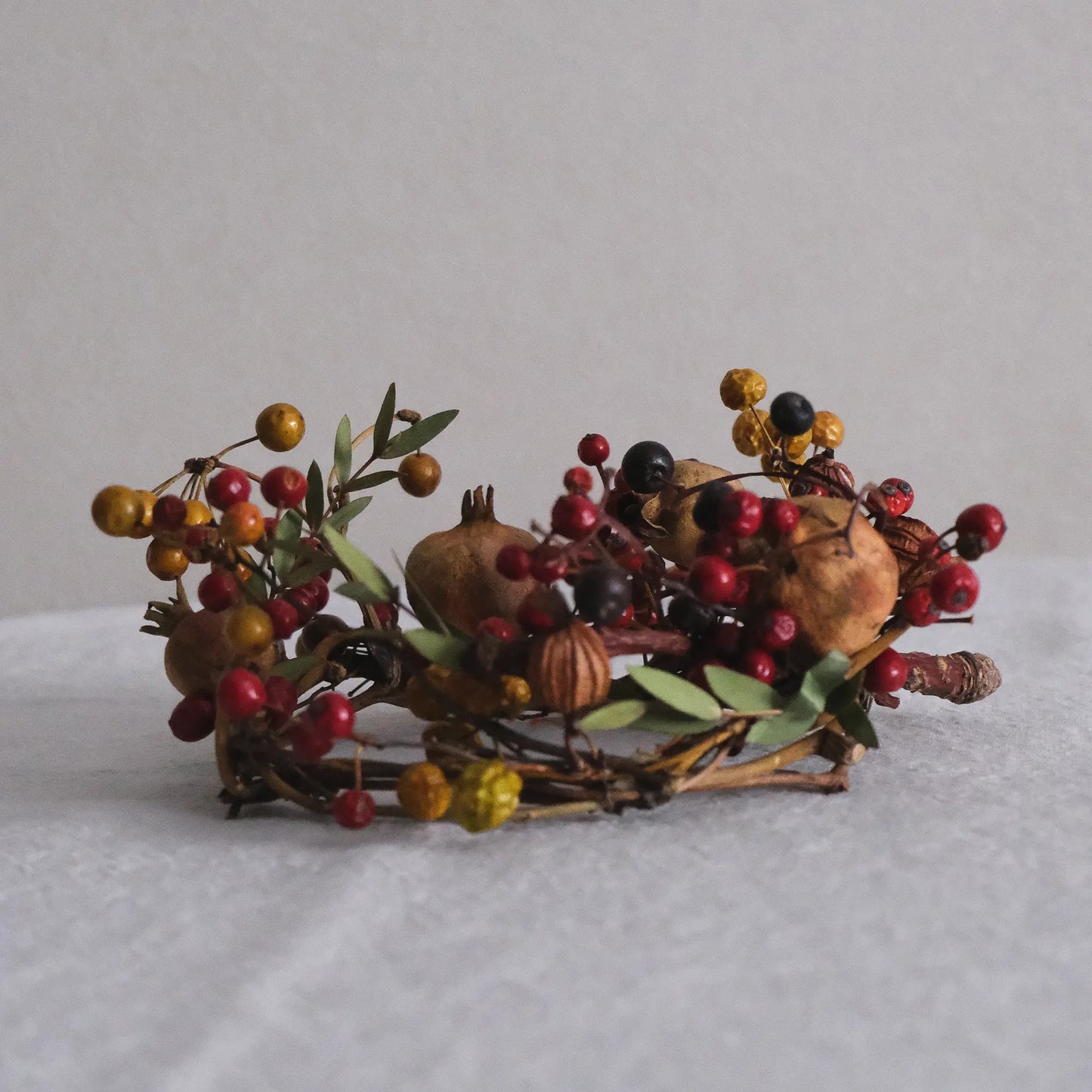 
                  
                    ざくろのキャンドルリース (M)
                  
                