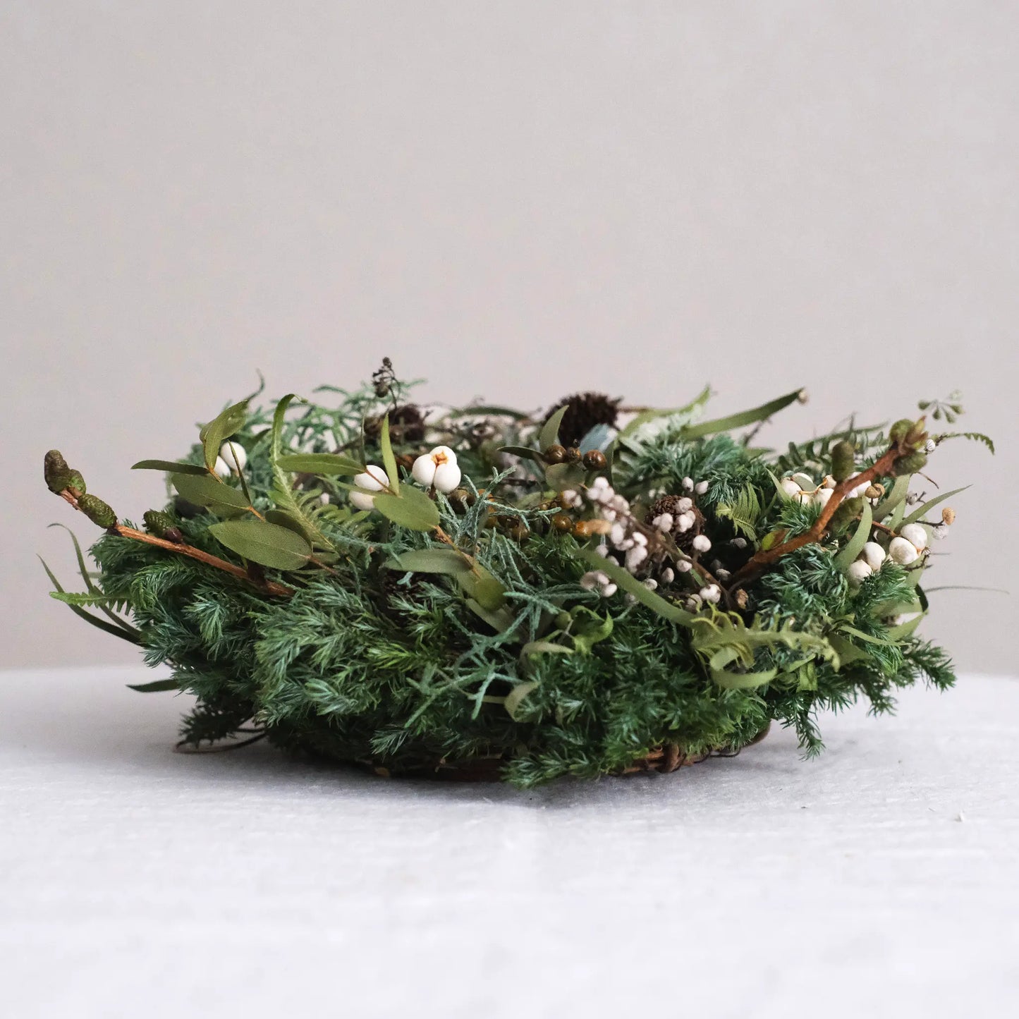 
                  
                    冬の緑のリース (L)
                  
                