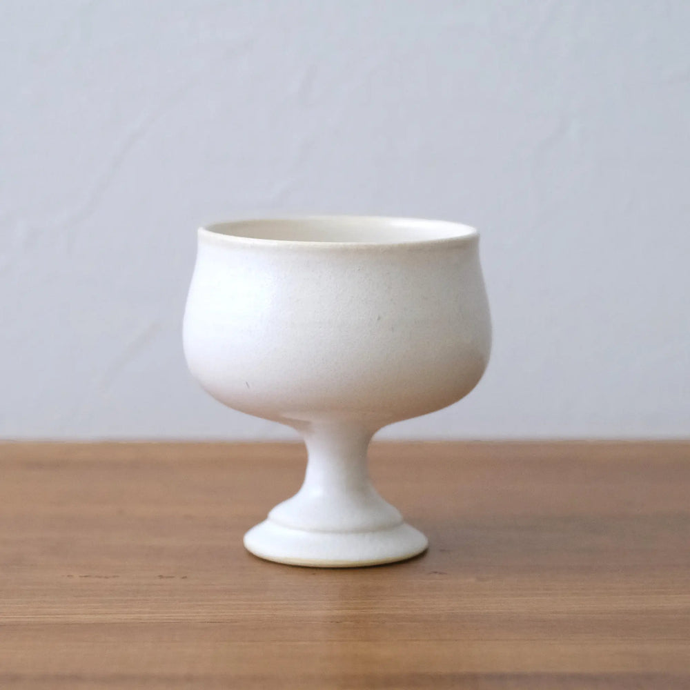 Cup with legs